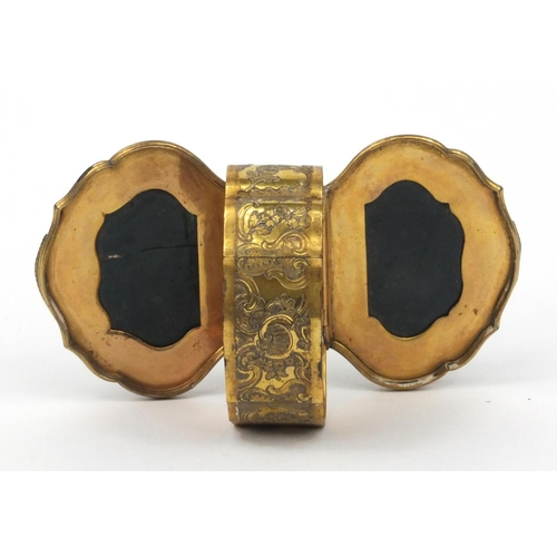 196 - Victorian gilt metal and hardstone double snuff box with floral chased decoration, 6cm diameter