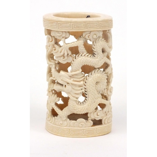 618 - Oriental Chinese ivory pot carved and pierced with dragons, 11cm high