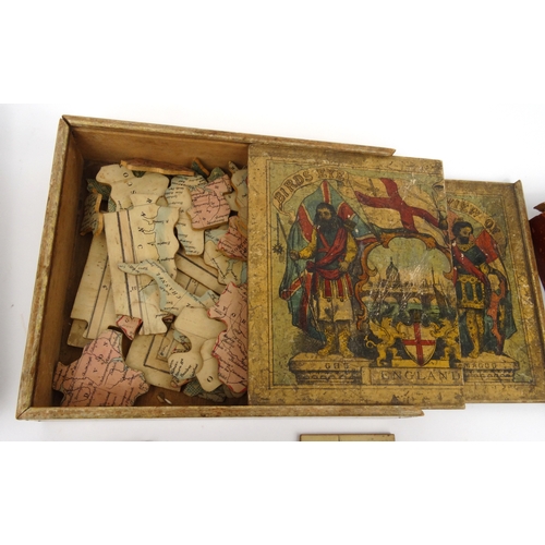 599 - Victorian wooden jigsaw puzzle Birdseye View of England, together with Getaway and a boxed Biblical ... 