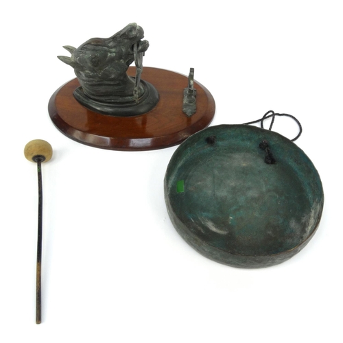 36 - Wooden bronzed horse's head dinner gong, 26cm diameter