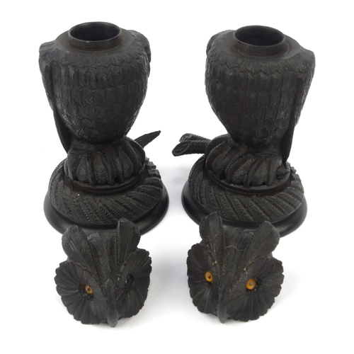 48 - Pair of Victorian bog oak owl pots and covers with beaded glass eyes, each 17cm high
