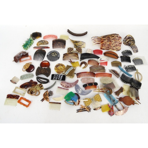 548 - Large collection of vintage hair pieces including faux tortoiseshell examples, the largest 23cm long