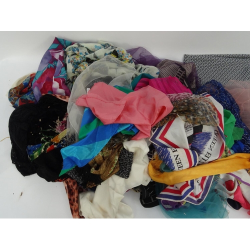 511 - Large selection of mostly vintage lady's scarves and shawls including silk examples