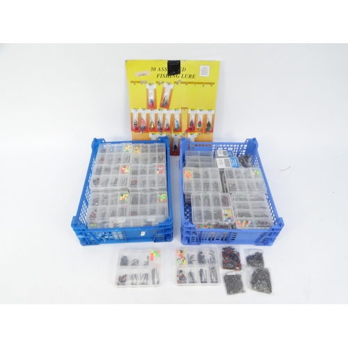 534 - Large collection of fishing rig-making equipment in sets, including hooks, swivels, beads, etc and a... 