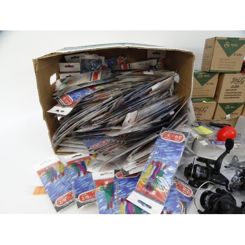 533 - Large collection of new mackerel fishing feathers, new fishing line, fishing reels, hooks and new re... 