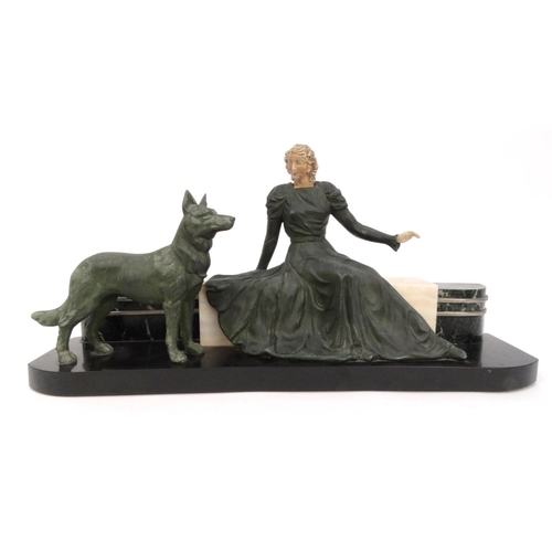 501 - Art Deco slate marble centrepiece mounted with a spelter lady in a flowing dress and dog, 67cm long