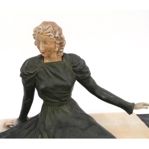 501 - Art Deco slate marble centrepiece mounted with a spelter lady in a flowing dress and dog, 67cm long