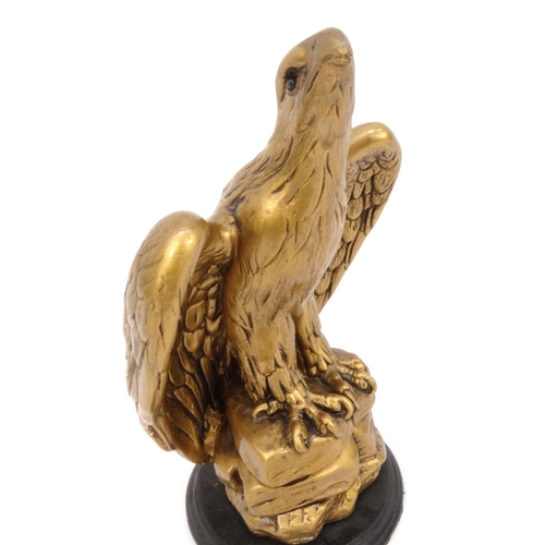 540 - Gilt plaster eagle, 31cm high