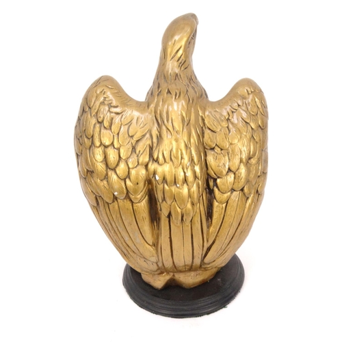 540 - Gilt plaster eagle, 31cm high