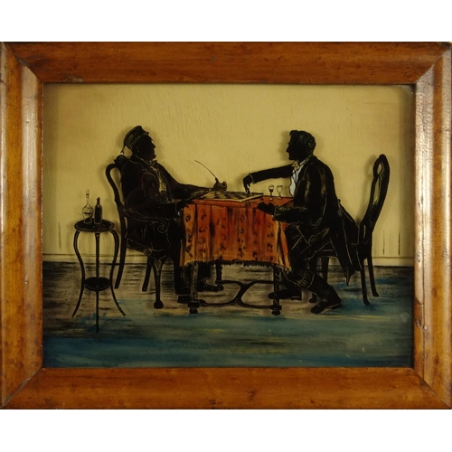 221 - Two Victorian reverse glass silhouette paintings - one of two gentleman playing chess, the other of ... 