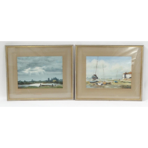 58 - Two Joan Russell watercolour views - one of moored boats and one of a lake landscape, both mounted a... 