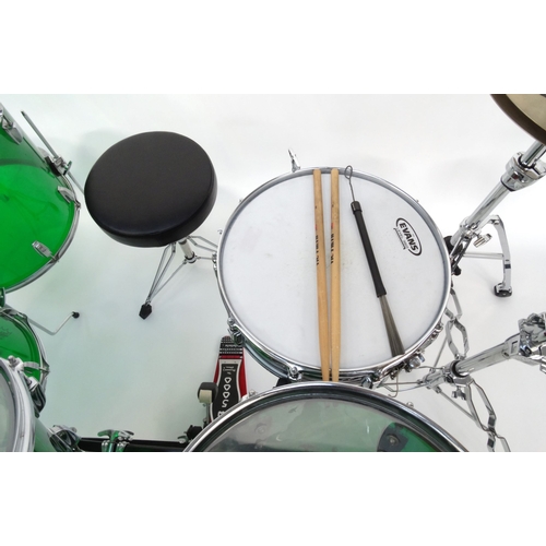 449 - Five piece 1970s Ludwig green Vistalite drum kit comprising 22inch base drum, 12 and 14inch toms, 16... 