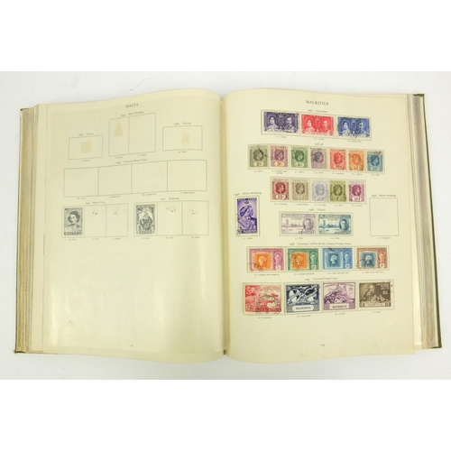 285 - King George VI stamp album with assorted Commonwealth stamps, together with a Tower stamp album with... 