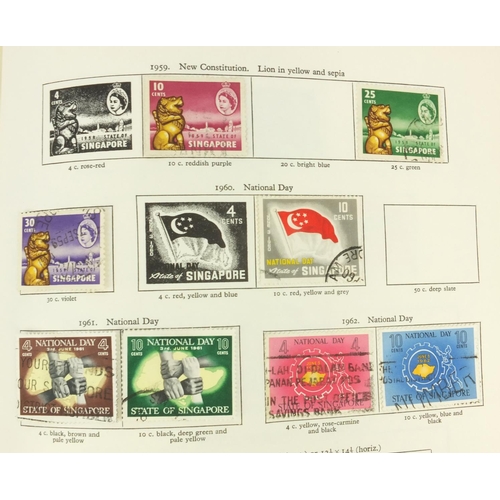 287 - Two New Age stamp albums with assorted British Commonwealth stamps