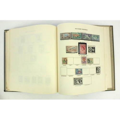 287 - Two New Age stamp albums with assorted British Commonwealth stamps