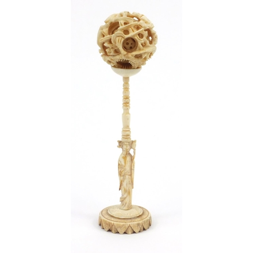 617 - Oriental Chinese carved ivory puzzle ball on stand, 16cm high