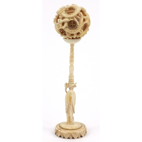 617 - Oriental Chinese carved ivory puzzle ball on stand, 16cm high