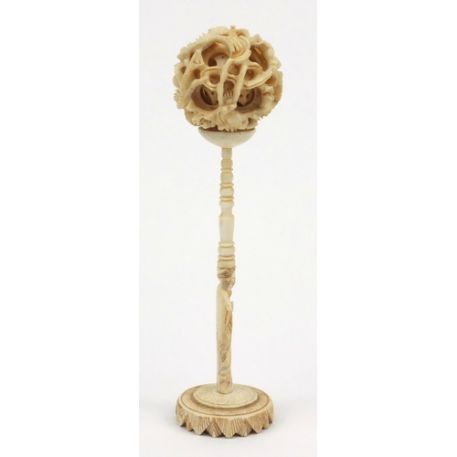 617 - Oriental Chinese carved ivory puzzle ball on stand, 16cm high