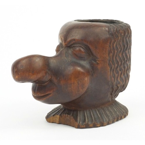 111 - Carved wooden novelty big nose gentleman pipe stand, 9cm high