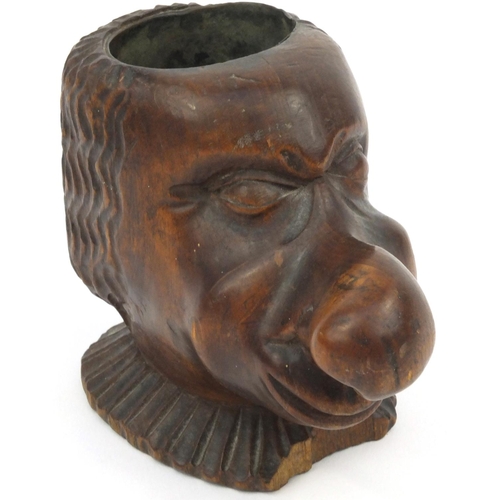 111 - Carved wooden novelty big nose gentleman pipe stand, 9cm high