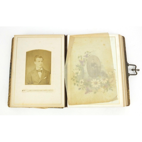 251 - Edwardian cabinet card album containing cabinet cards including one of a clown and families, etc