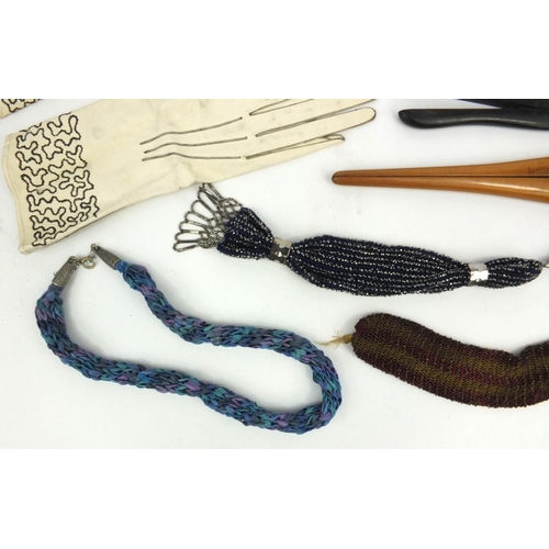 183 - Pair of lady's kidskin gloves, ivory glove stretchers, beaded miser's purses and a boxed hosiery lad... 