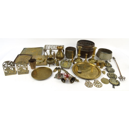 457 - Assorted copper and brass items including trays, trivet, horse brasses, Middle Eastern items, etc