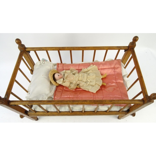 450 - Victorian dolls crib and a French bisque head doll