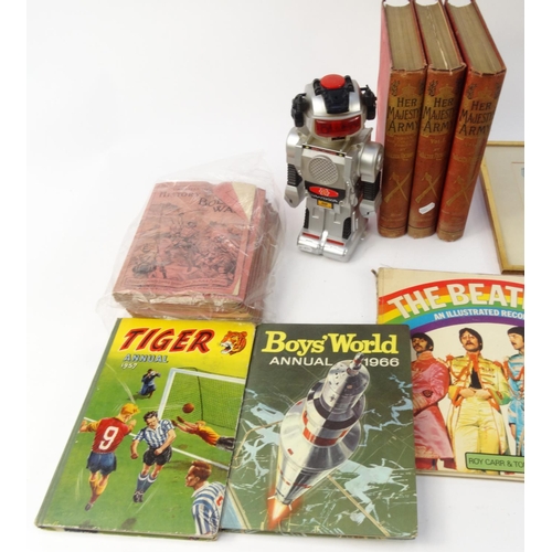 477 - Box of assorted ephemera including three volumes of Her Majesty's Army, Beatles books, toy robot, et... 