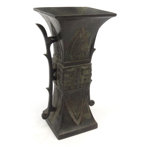 431 - Oriental bronze square vase, 21.5cm high