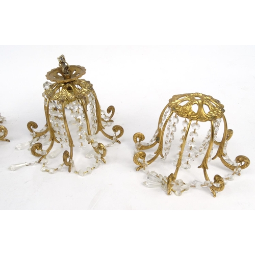 455 - Pair of brass and glass chandeliers and a pair of similar wall lights