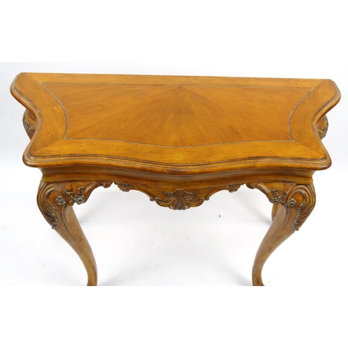 3 - Carved walnut hall table, 86cm high x 122cm wide x 51cm deep