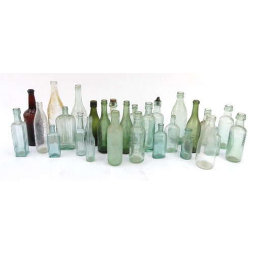 513 - Large selection of antique glass bottles