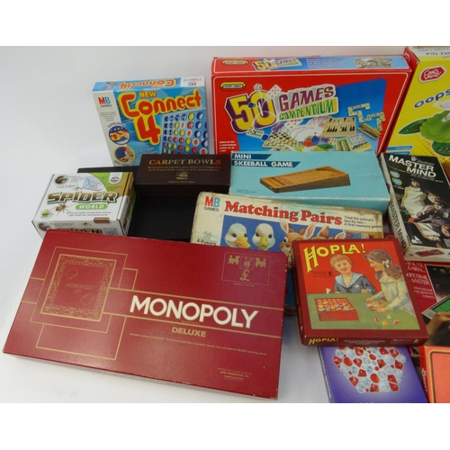 454 - Two boxes of vintage and later board games including Ker-Plunk, Connect 4, Othello, Monopoly, etc