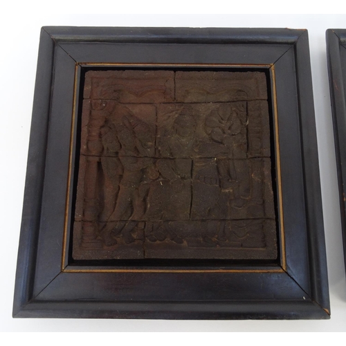 413 - Pair of Thai antique style plaques with ebonised wood frames, the plaques 19.5cm square