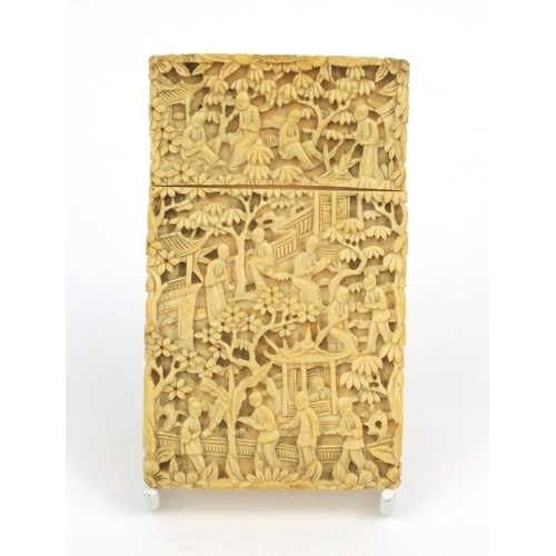 613 - Oriental Chinese ivory card case carved with scenes of elders, pagodas and trees, 9.5cm high