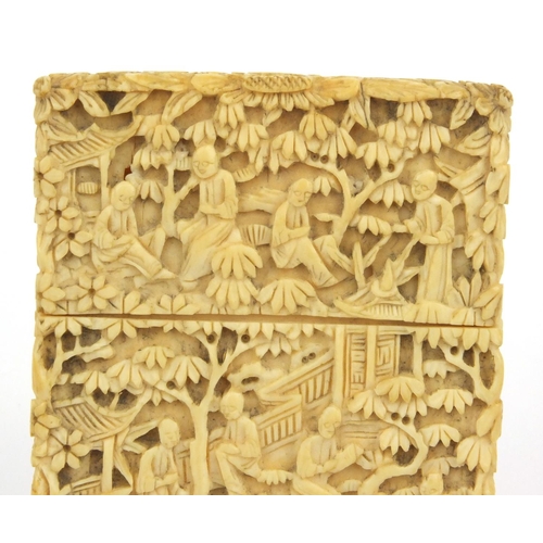 613 - Oriental Chinese ivory card case carved with scenes of elders, pagodas and trees, 9.5cm high