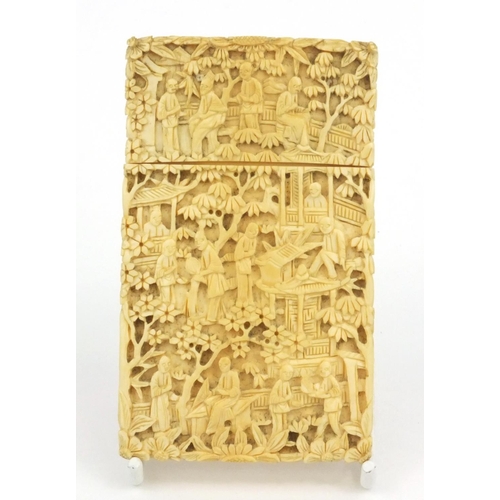 613 - Oriental Chinese ivory card case carved with scenes of elders, pagodas and trees, 9.5cm high