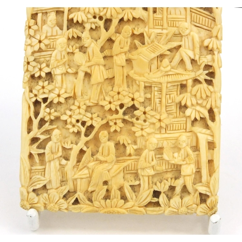 613 - Oriental Chinese ivory card case carved with scenes of elders, pagodas and trees, 9.5cm high