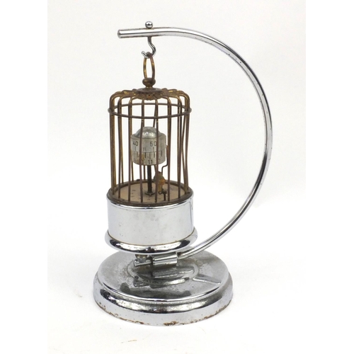 1310 - Kaiser Orbital birdcage clock with hanger, 21cm high