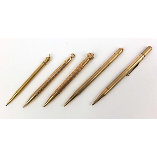 93 - Five propelling pencils including one 9ct gold example, the largest 12cm long