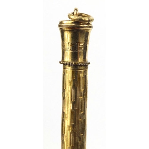 93 - Five propelling pencils including one 9ct gold example, the largest 12cm long