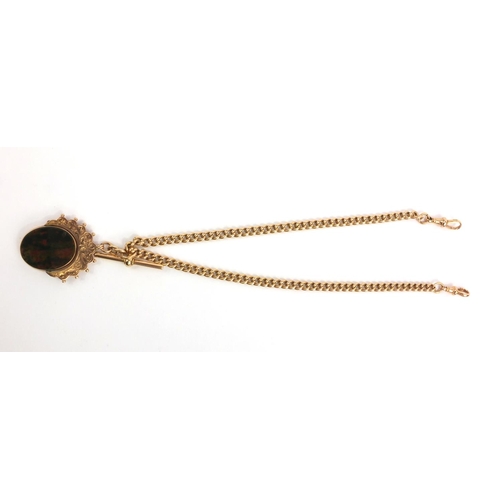 1286 - 15ct gold watch chain with T-bar and large 9ct gold hardstone spinner fob, the chain 36cm long, appr... 