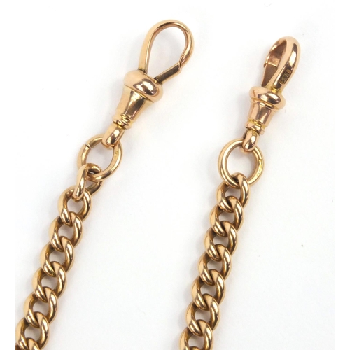 1286 - 15ct gold watch chain with T-bar and large 9ct gold hardstone spinner fob, the chain 36cm long, appr... 