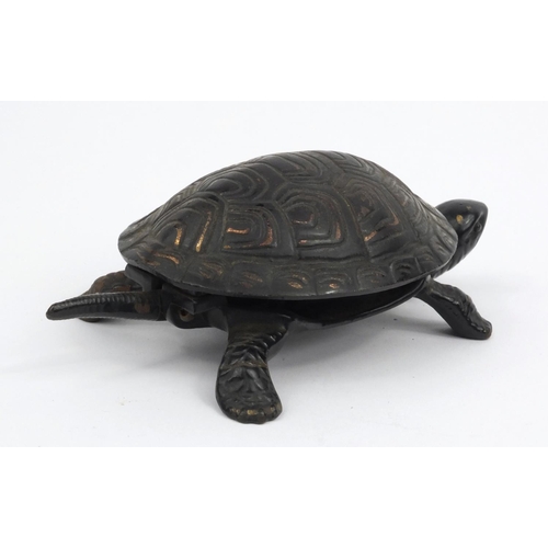 49 - Novelty cast iron tortoise table bell, 17cm diameter