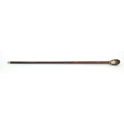 62 - Walking stick, the pommel modelled as a knight's head wearing a helmet, with moveable visor, the sti... 