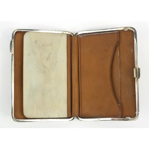 190 - Rectangular silver purse with propelling pencil and ivory page, the case with floral chased decorati... 