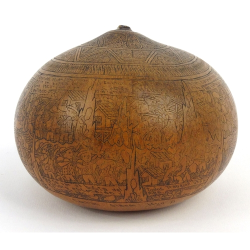 403 - Victorian penwork nut with scenes of storytelling, 10cm diameter