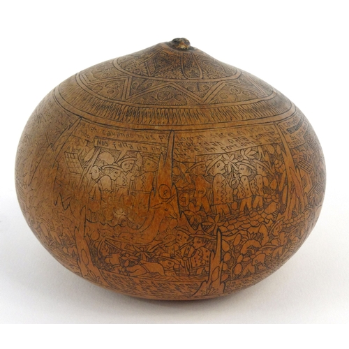 403 - Victorian penwork nut with scenes of storytelling, 10cm diameter