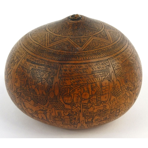 403 - Victorian penwork nut with scenes of storytelling, 10cm diameter